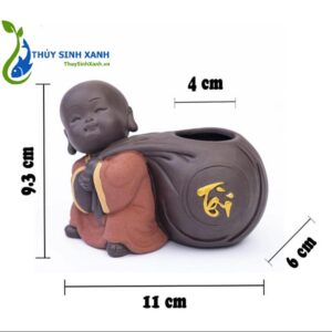 Tượng chú tiểu trồng cây