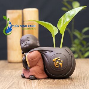 Tượng chú tiểu chữ tài
